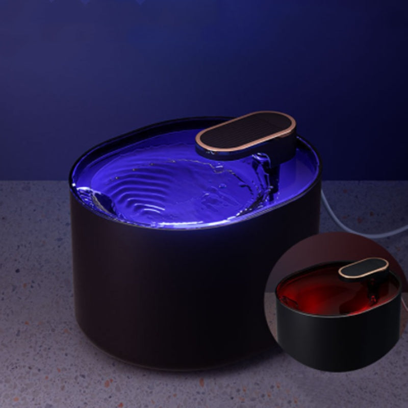 Automatic pet water fountain with blue illuminated water, and a smaller red illuminated version.